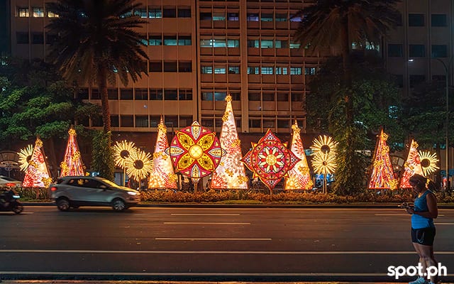 The colorful parols of Ayala Avenue fronting the Ayala Triangle Gardens