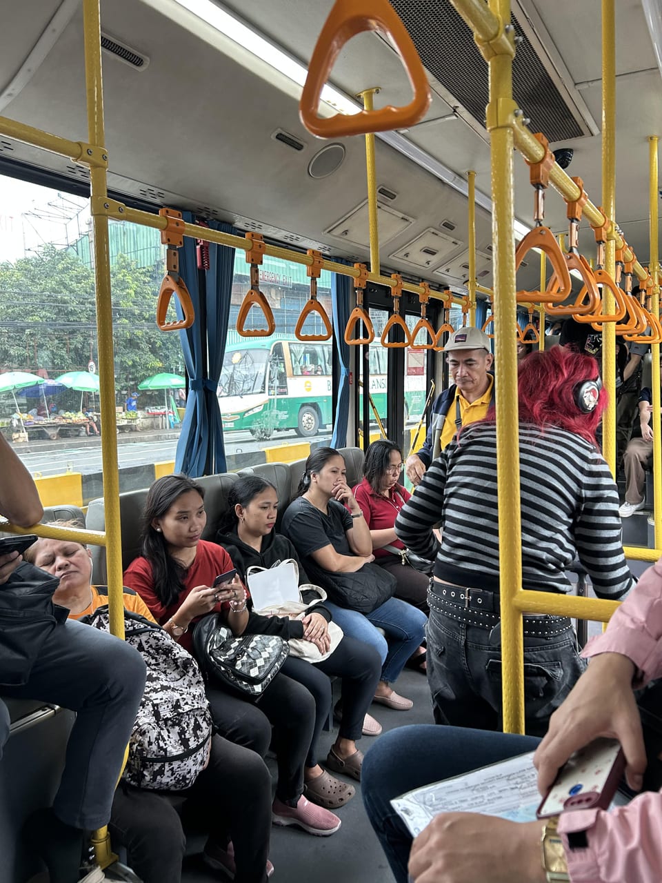 Buses are air-conditioned—but sometimes the coldness is cranked way up, so it’s smart to bring a jacket if you get easily chilly. Seats are comfortable enough for the long stretch of EDSA, but be prepared to stand during peak hours. According to the Department of Transportation (DOTr), roughly 250,000 commuters rely on the EDSA Carousel every day.