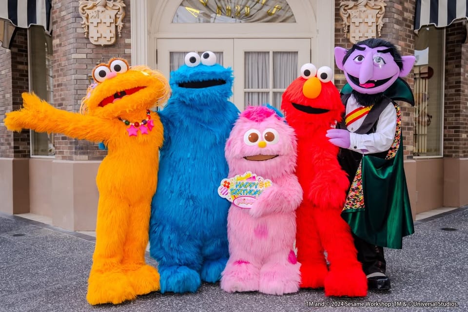 Zoe, Cookie Monster, Moppy, Elmo and Count von Count