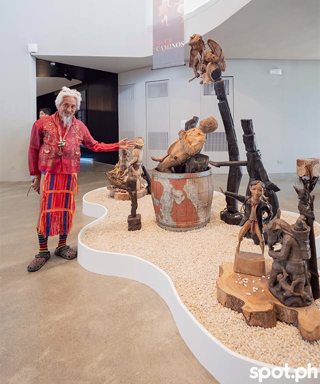 National Artist Kidlat Tahimik alongside his installation