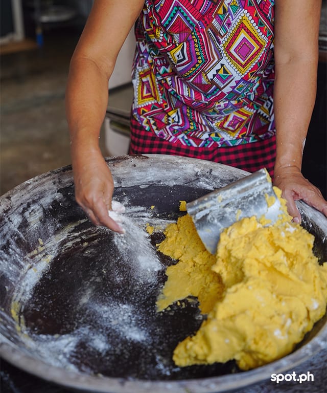 By Gonzales slowly adds milled uraro to a mixture of flour and butter, carefully handcrafting each batch of these delicate cookies.