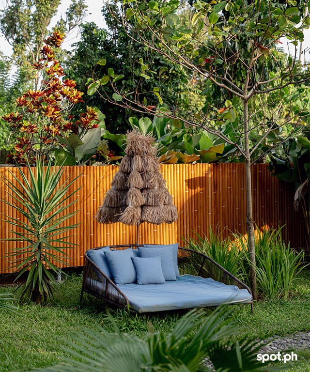 There are lots of outdoor seating like this so guests can enjoy the garden and fresh country air at The Bali Farm