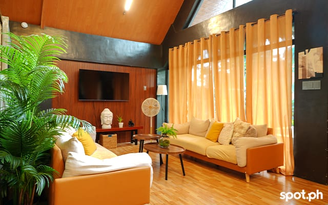 The living room of the larger three-bedroom villa