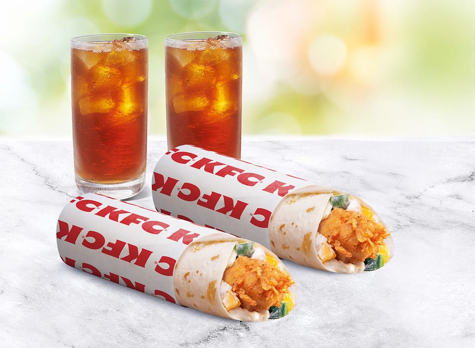 A photo of KFC's new Tenders Twisters with iced teas